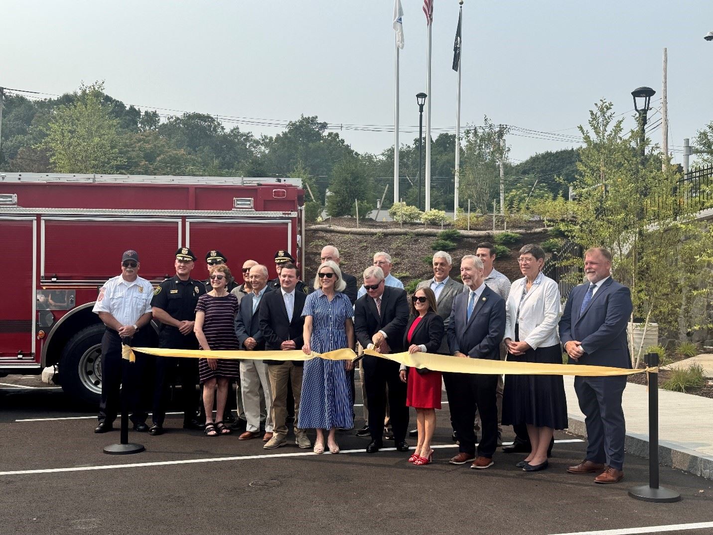 People cutting ribbon